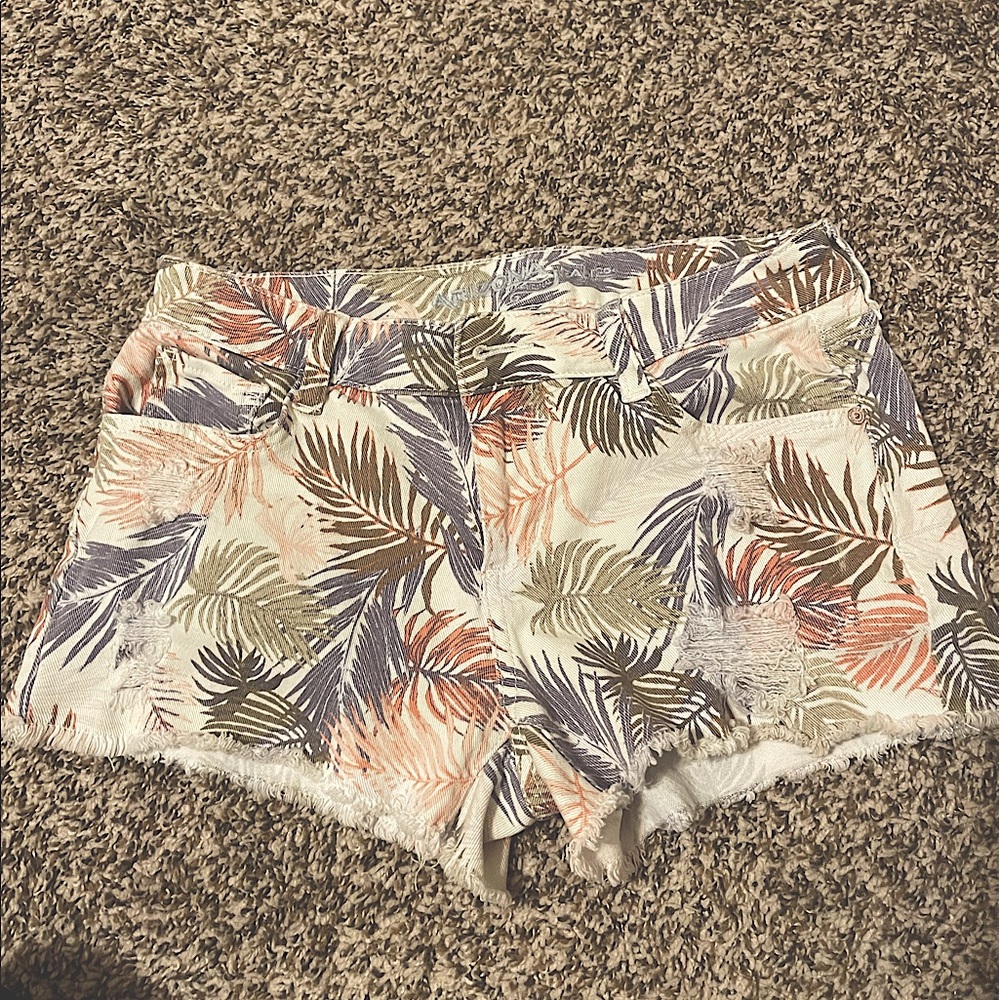 Tropical denim shorts.